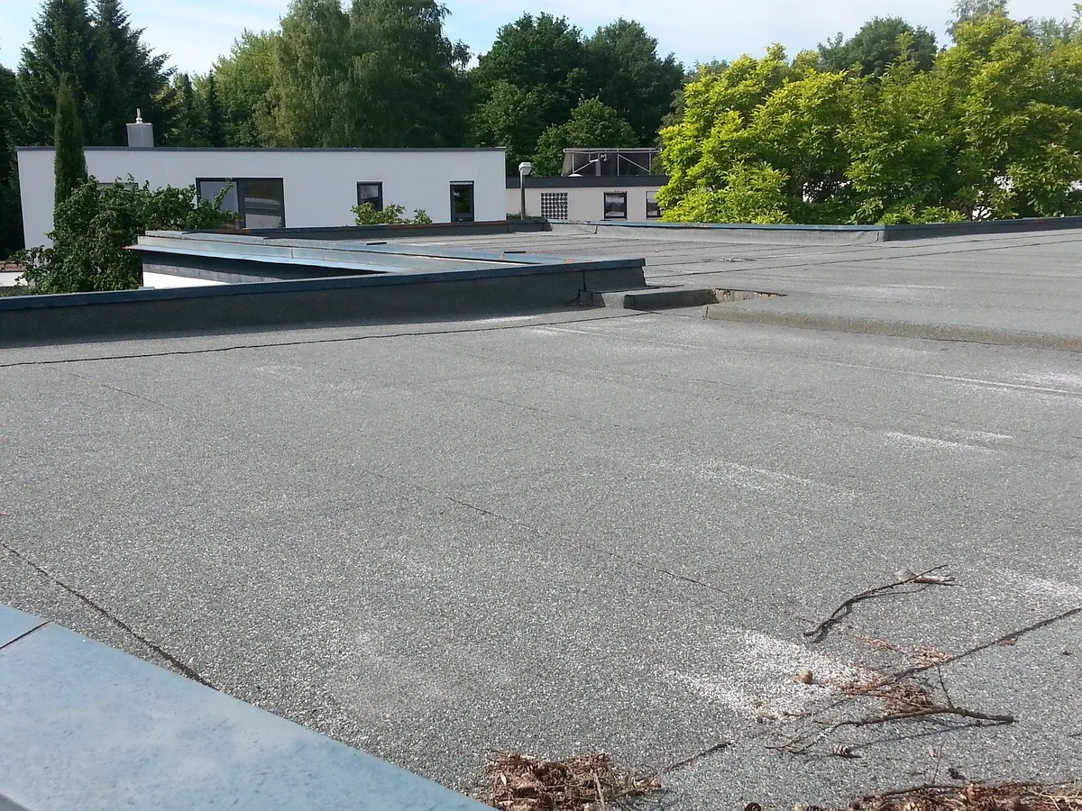 Garage Roof Repairs work on a roof