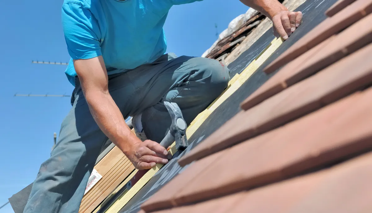 Roof Repairs work on a roof